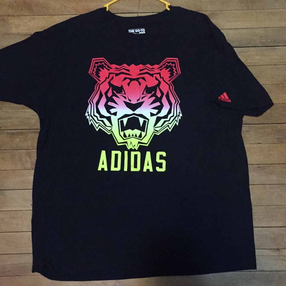 Adidas the go-to tee. Cool tiger logo.